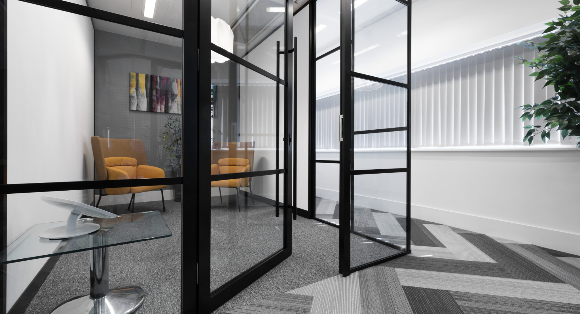 Innovative acoustic glazed doors for a multimedia company